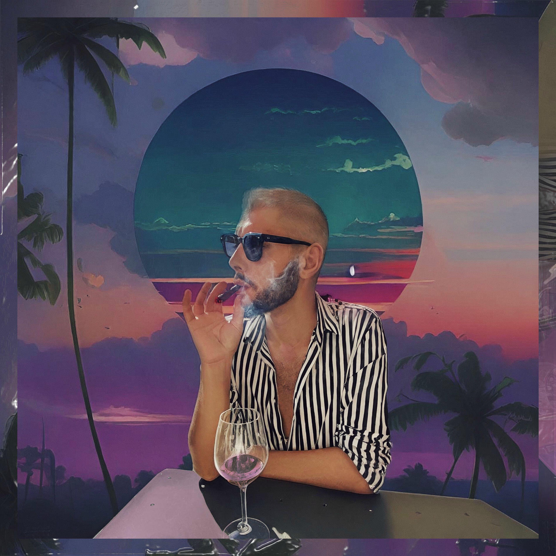 Electronic artist Xandre Bianco in tropical neon setting. Imperia, Italia